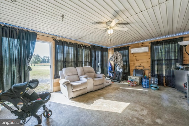 interior space with ceiling fan and a wall unit AC