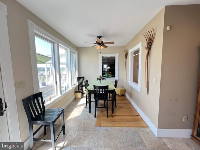 dining room with ceiling fan