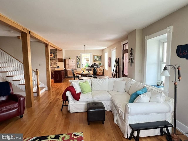 living room with light hardwood / wood-style flooring