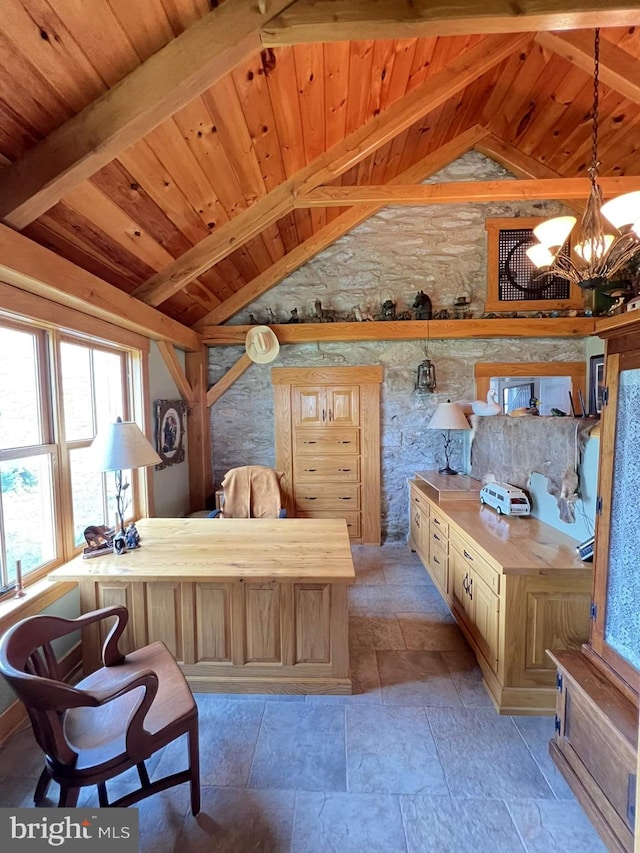 kitchen featuring butcher block counters, pendant lighting, wooden ceiling, and a notable chandelier