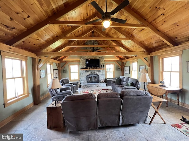 living room featuring vaulted ceiling with beams, plenty of natural light, and wooden ceiling