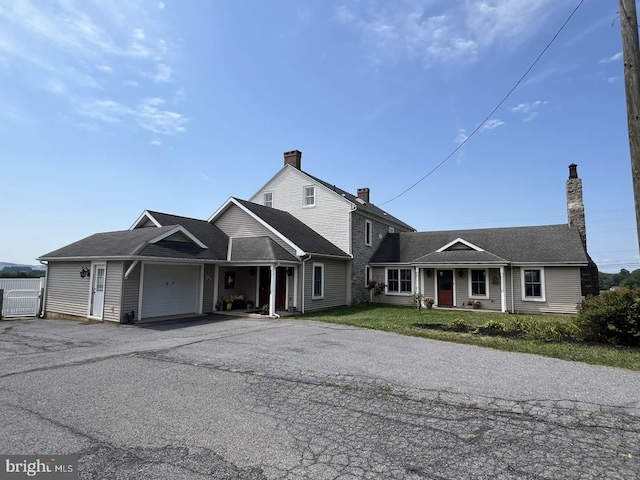 view of front of property featuring a garage