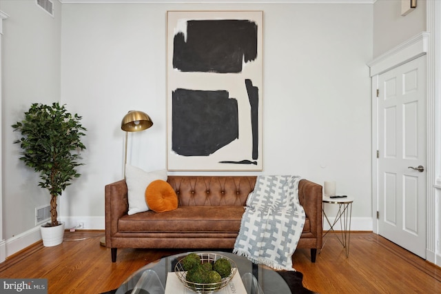 living area with wood-type flooring