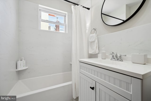 bathroom with vanity and shower / bathtub combination with curtain