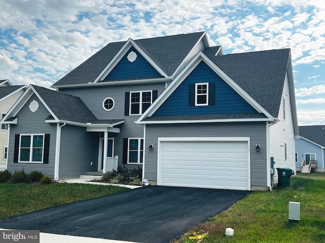 craftsman-style home with a garage