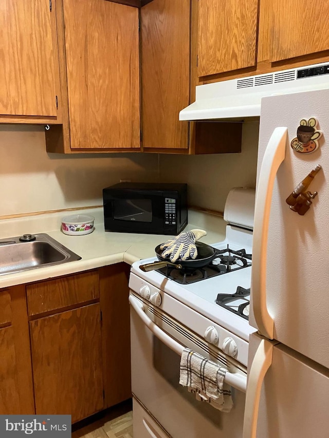 kitchen with white appliances