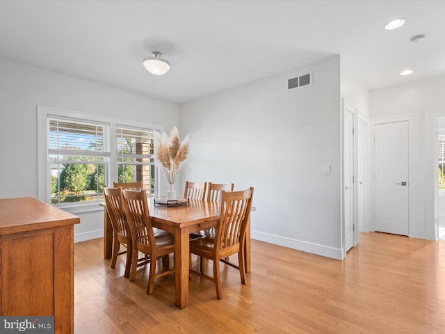 dining space featuring light hardwood / wood-style flooring