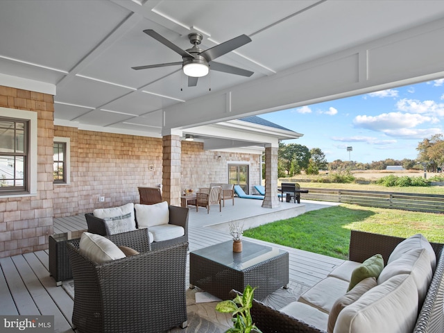 view of patio / terrace featuring ceiling fan, a deck, and an outdoor hangout area