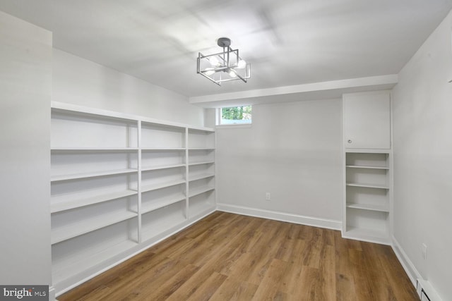 storage area with a baseboard radiator