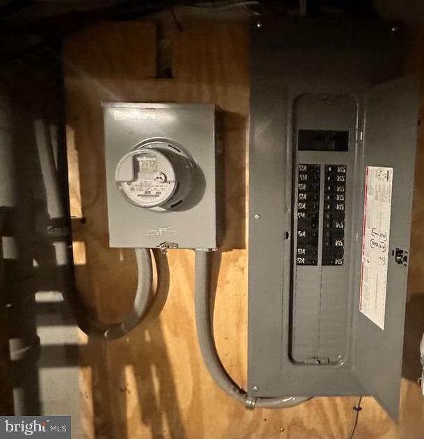 utility room featuring electric panel