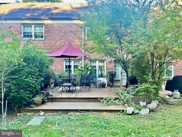 wooden terrace with grilling area