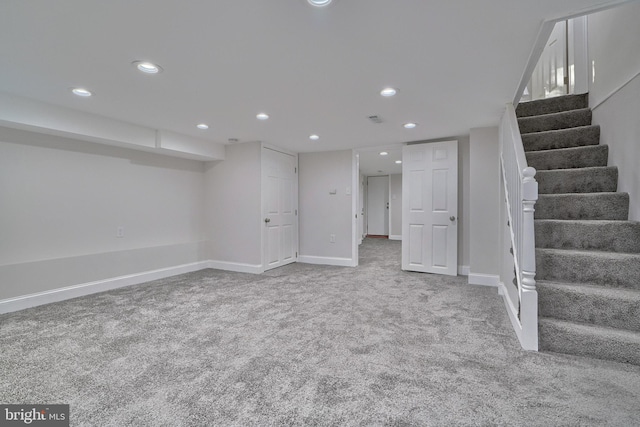 basement with carpet flooring