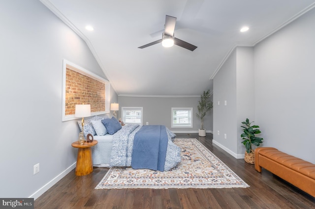 bedroom with ceiling fan, lofted ceiling, crown molding, and dark hardwood / wood-style flooring