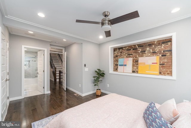 bedroom with crown molding, ceiling fan, connected bathroom, and dark hardwood / wood-style floors