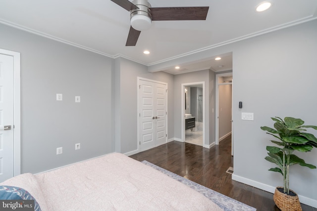 bedroom with ceiling fan, ornamental molding, dark hardwood / wood-style floors, and ensuite bathroom