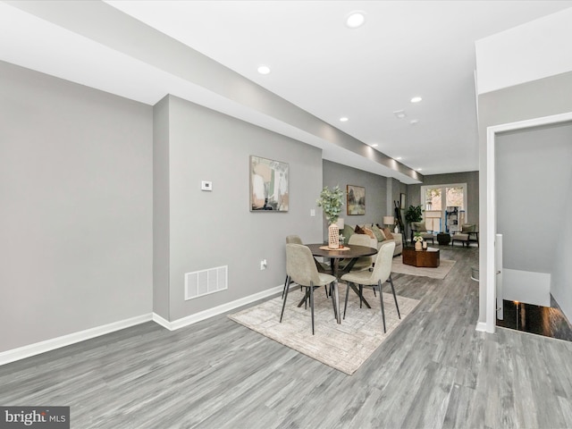 dining area featuring light wood-type flooring