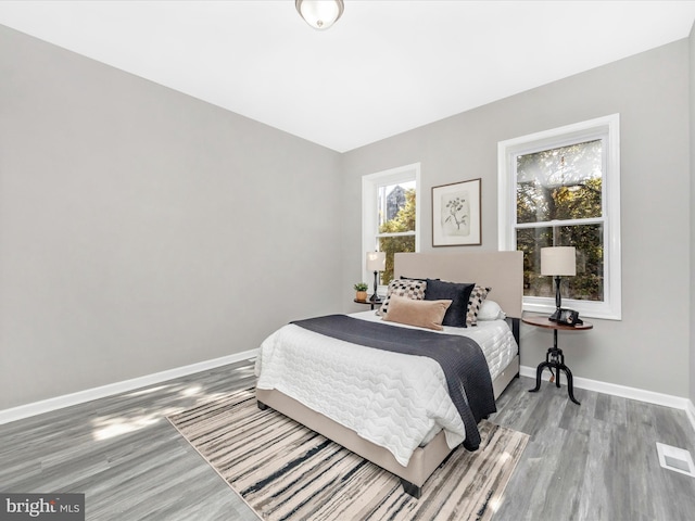 bedroom featuring wood-type flooring