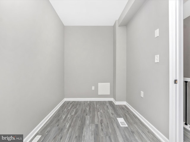 empty room with light hardwood / wood-style floors