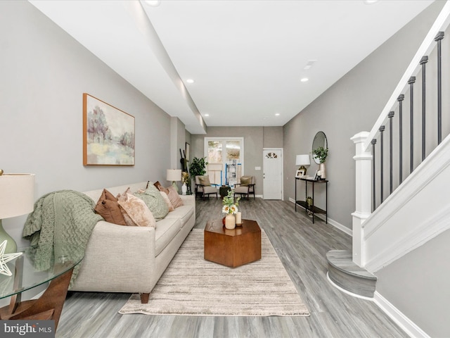 living room with light hardwood / wood-style flooring