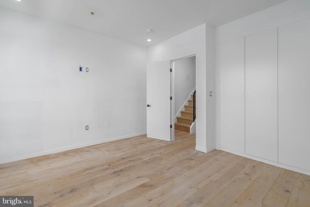 empty room with light wood-type flooring