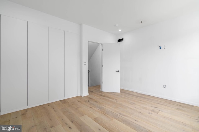 unfurnished bedroom featuring light hardwood / wood-style floors