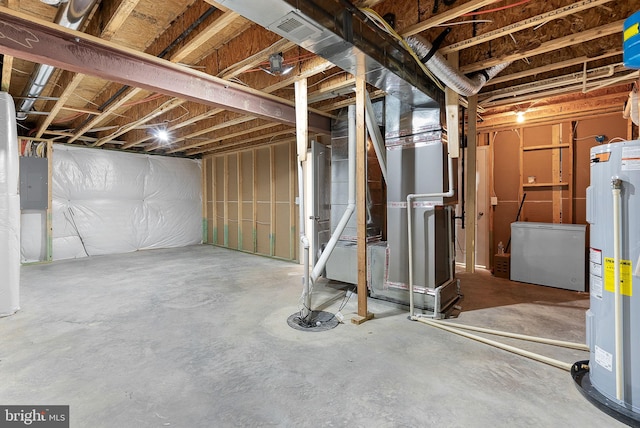 basement with electric water heater and heating unit