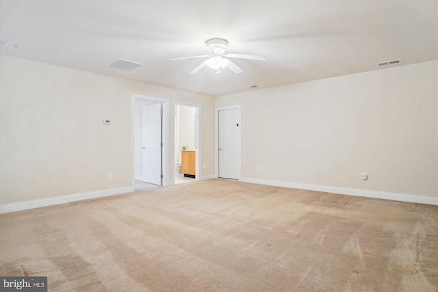 carpeted empty room with ceiling fan