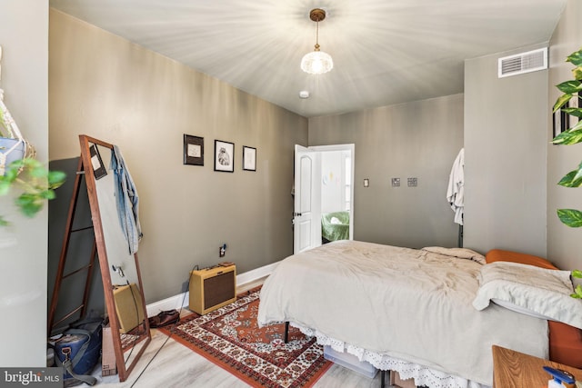 bedroom featuring light hardwood / wood-style flooring