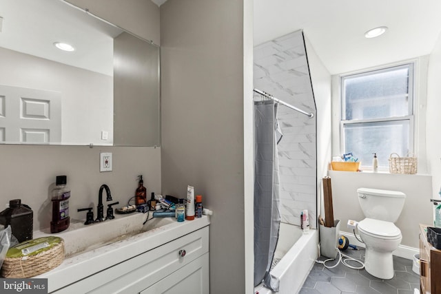 full bathroom featuring tile patterned flooring, vanity, toilet, and shower / bath combination with curtain