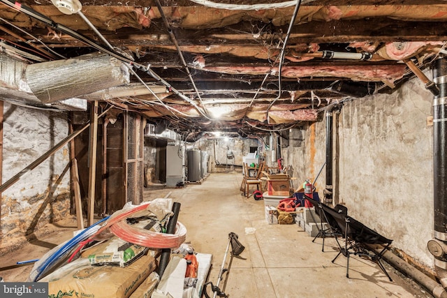 basement featuring water heater