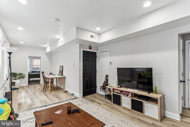 living room with light wood-type flooring