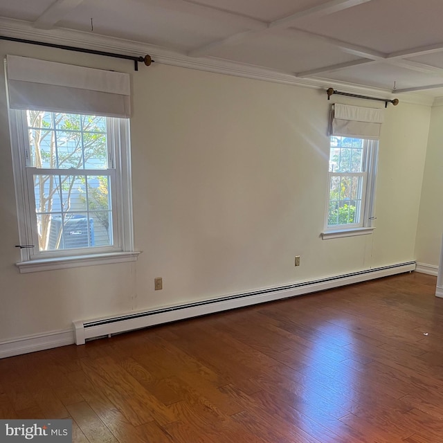 spare room with crown molding, hardwood / wood-style floors, coffered ceiling, and a baseboard radiator