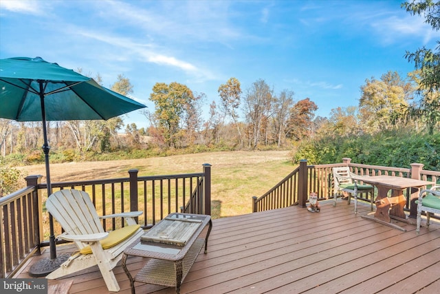 deck featuring a yard