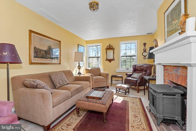 living room featuring a wood stove