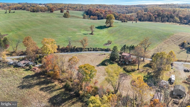 birds eye view of property featuring a rural view