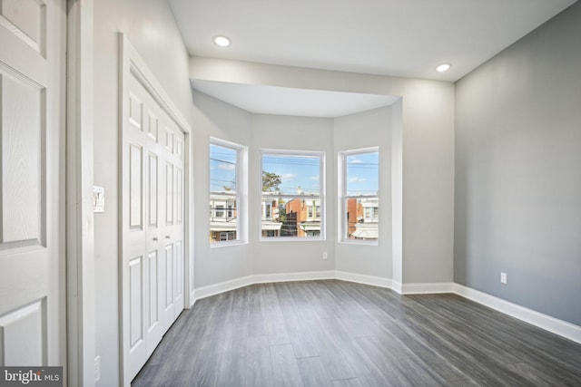 entrance foyer with dark hardwood / wood-style flooring