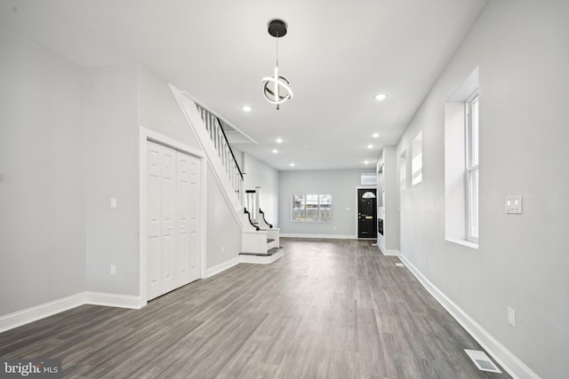 interior space with dark hardwood / wood-style floors