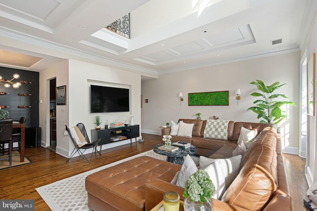 living room with dark wood-type flooring and crown molding