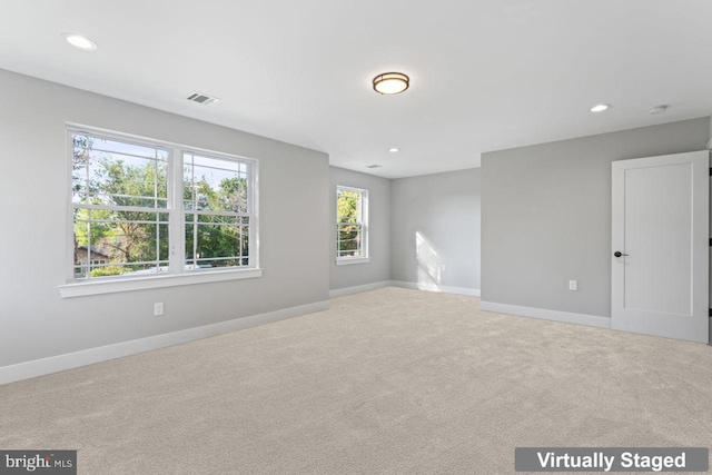 view of carpeted spare room