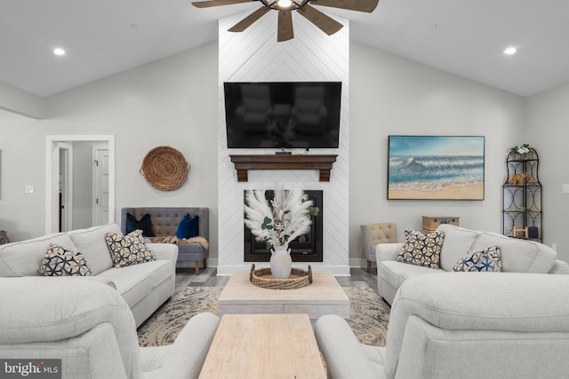 living room with high vaulted ceiling, wood-type flooring, and ceiling fan