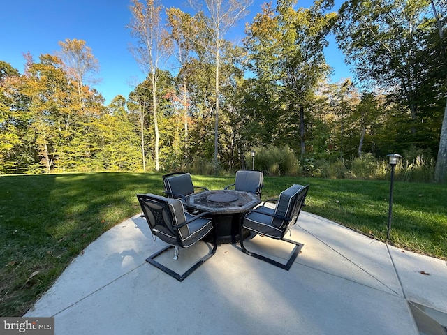 view of patio featuring a fire pit