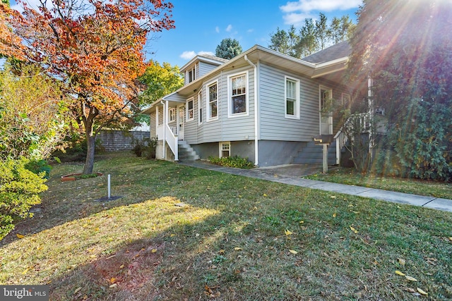 view of home's exterior featuring a yard