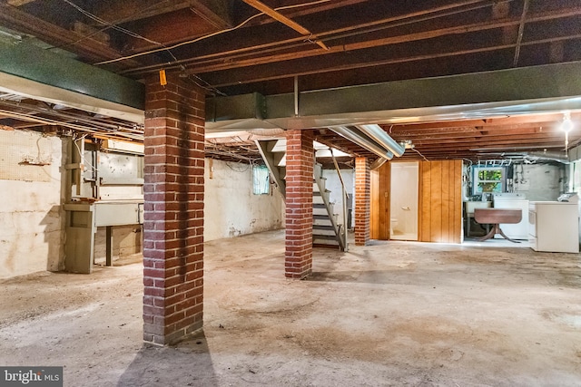 basement with separate washer and dryer