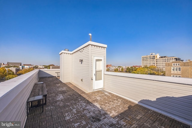 view of patio / terrace with a balcony