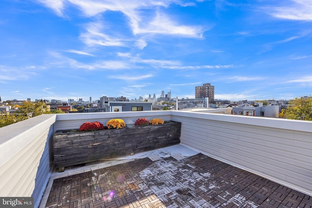 view of patio featuring a balcony