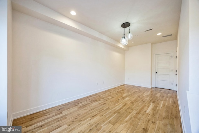 unfurnished room featuring light hardwood / wood-style flooring