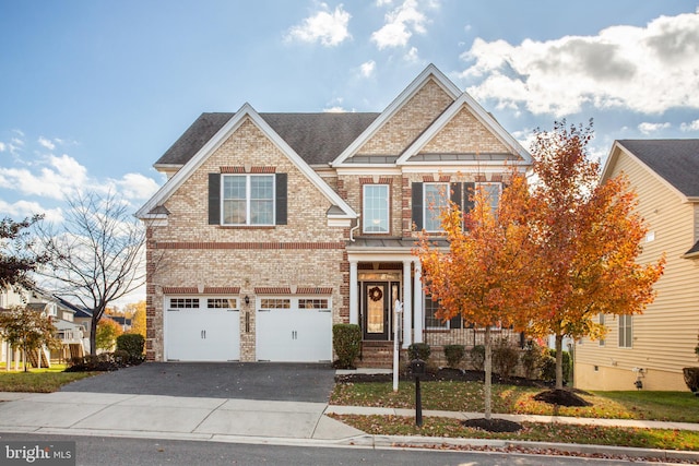 craftsman inspired home with a garage