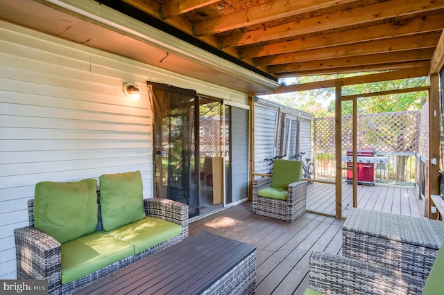 wooden terrace featuring grilling area