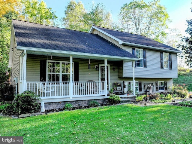 48 W 3rd St, Everett, PA 15537 - split level home featuring a porch, a front yard, and roof with shingles