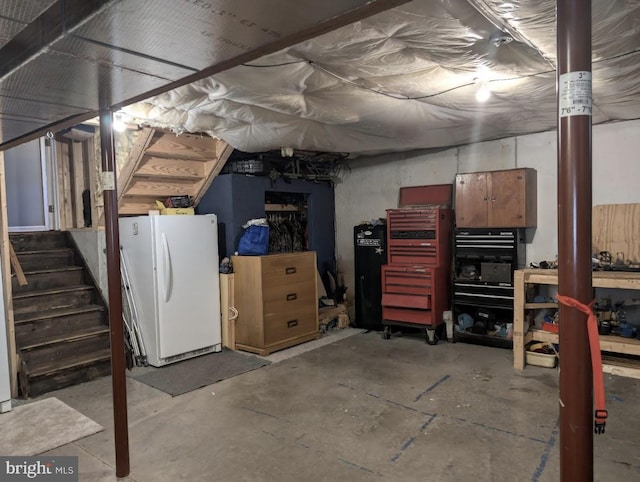 48 W 3rd St, Everett, PA 15537 - unfinished basement featuring freestanding refrigerator and stairway